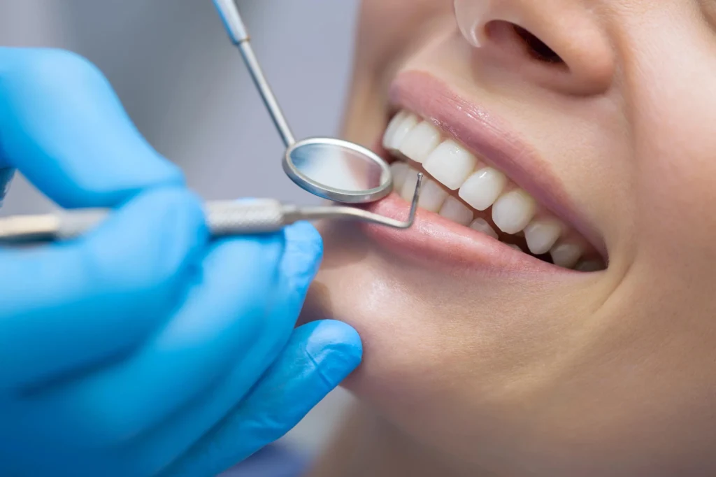 Dental exam during cosmetic consultation smile makeover in Durham