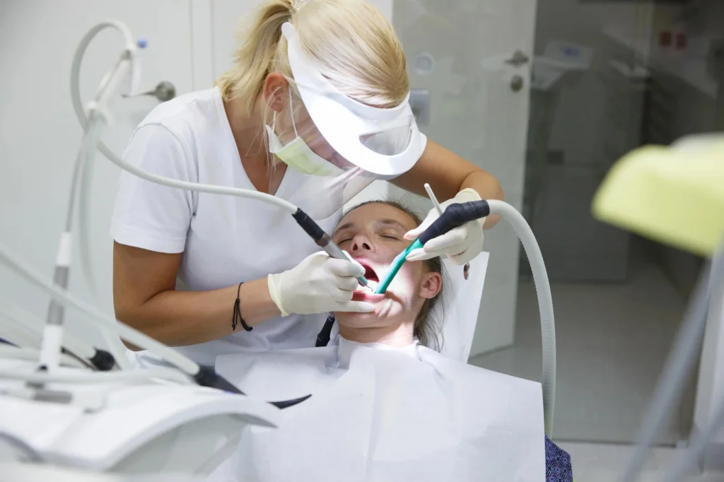 Dentist repairing decayed tooth repair decayed teeth