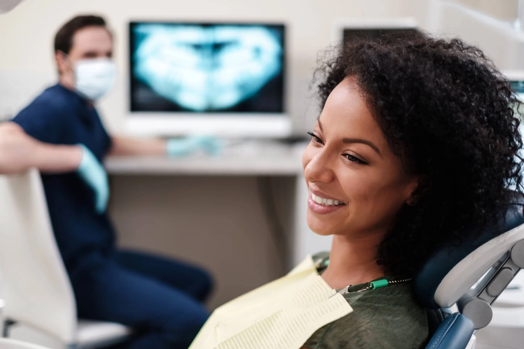 Happy-patient-at-dental-restoration-specialist